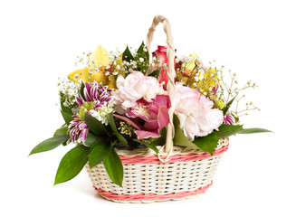 the wicker basket of mixed flowers on white background - 98131105