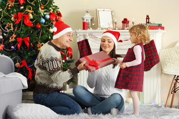 Happy Family on Christmas tree background