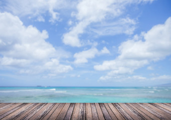 Fototapeta na wymiar Wood floor with blurred sea background