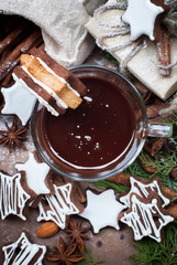Tiny Chocolate Christmas Cookies with Icing Sugar on Cup