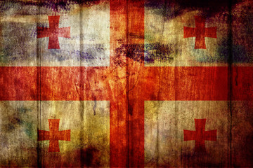 Georgia flag on old wood background
