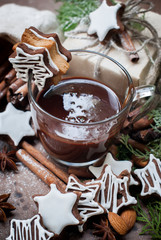 Tiny Chocolate Christmas Cookies with Icing Sugar on Cup