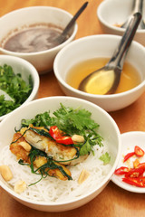 Vietnamese grilled turmeric fish with dill, Cha ca La vong, popular in Hanoi.