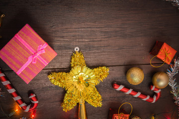 Christmas gift box, food decor and fir tree branch on wooden table. Top view with copy space