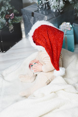 photo of cute baby in Santa hat