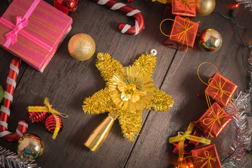 Christmas gift box, food decor and fir tree branch on wooden table. Top view with copy space
