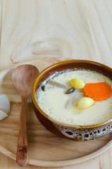 steamed egg on wood background