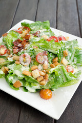 salad caesar on table backgckground