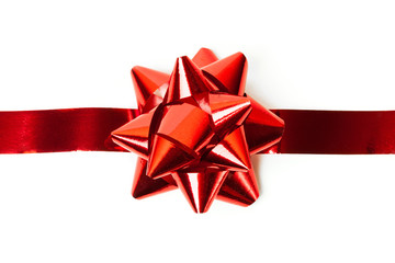 Gift red ribbon and bow isolated on white.