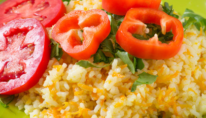 Rice with vegetables and rucola