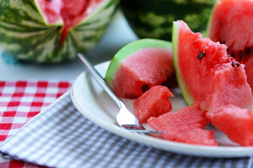 Sliced watermelon on plate closeup
