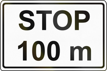 Slovenian road sign - Stop sign ahead after the distance shown