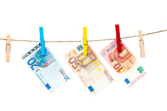 Euro notes on clothesline.  Money laundering euros