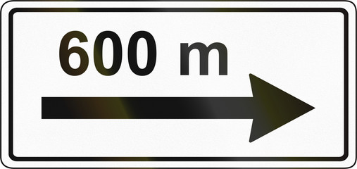 Slovenian road sign - Above sign effective ahead in the direction and distance shown