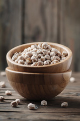 Uncooked chickpea on the vintage table