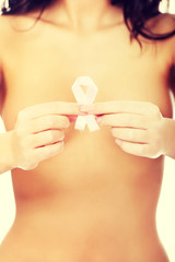 Topless woman with pink ribbon.