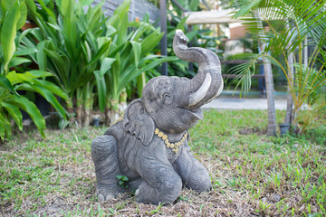 Elephant sculpture statue on grass
