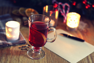 Christmas letter on the table with spices