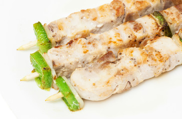 chicken skewers on white background