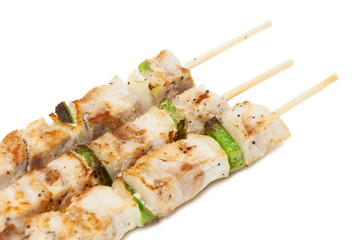 chicken skewers on white background