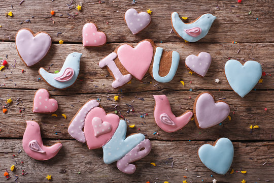 background of love gingerbread cookies. horizontal top view
