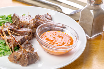 Beef slices with sauce