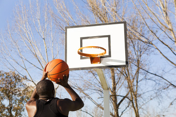 Street basket player playing outdoors