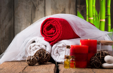 spa massage setting, product, oil on wooden background