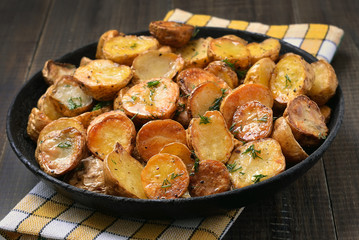 Fried potato in pan