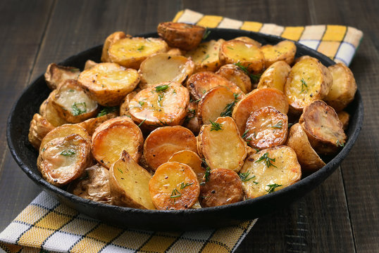 Fried potato in pan