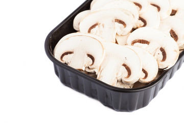 mushrooms in a black box on a white backgound
