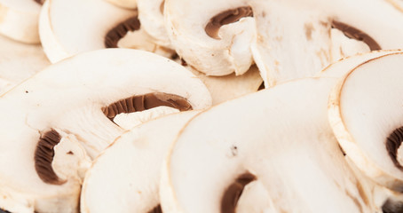 sliced mushrooms on a white background