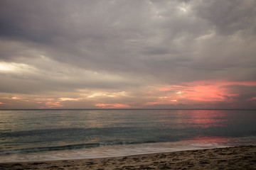 Fototapeta premium Sea view on the background of beautiful sunset. Toned