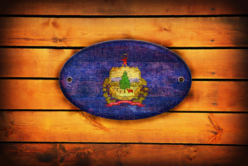 Fototapeta na wymiar A wooden Vermont flag.