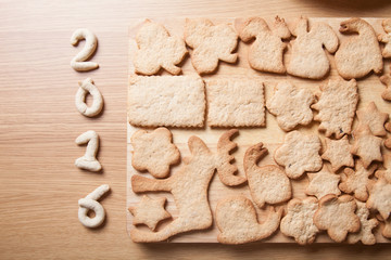 Gingerbread cookie in different shapes and figeres 2016 on light