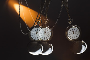 Antique silver pocket watch on a chain