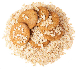 heap of oats and biscuits on a white background