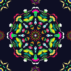 Pattern ornament in a circle on a dark  blue background, with different flowers and leaves