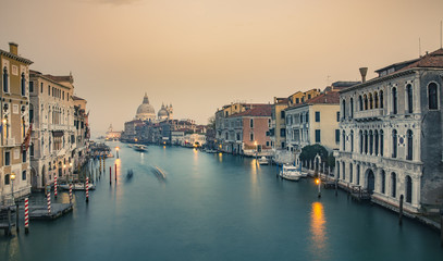 Fototapeta na wymiar Grand Canal and Basilica Santa Maria della Salute during sunset, Venice, Italy