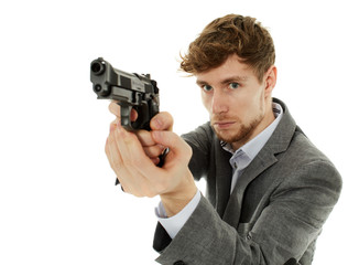 Closeup of a young man with a gun