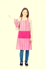 Happy teen woman wearing kitchen apron.