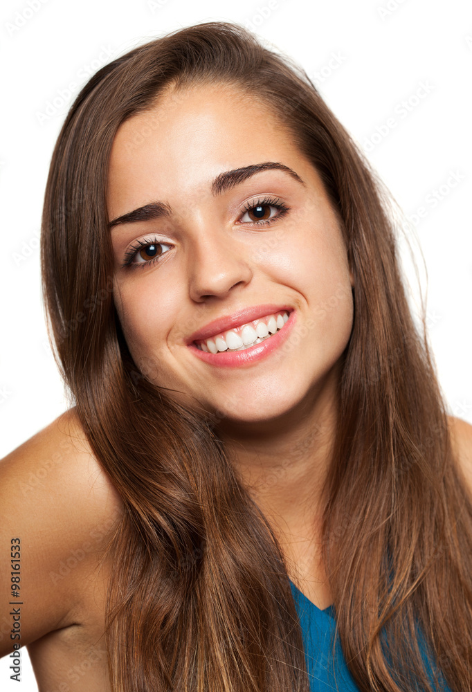 Wall mural pretty young woman face on a white background