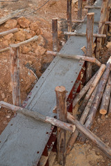 Fototapeta na wymiar pillar and beam being constructed at construction site