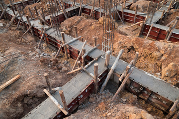 Fototapeta na wymiar pillar and beam being constructed at construction site