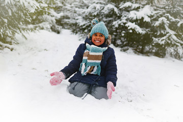 Fototapeta na wymiar Girl in snowdrift