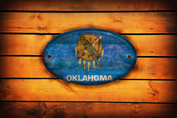Obraz na płótnie Canvas Wooden Oklahoma flag.
