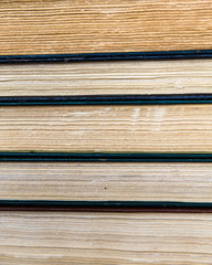 Close composition of stack of well worn used books