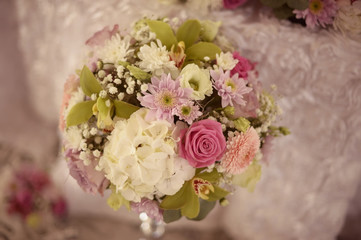 Fototapeta na wymiar Beautiful bridal bouquet in colorful flowers