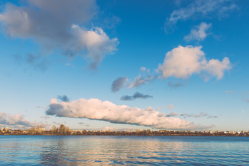 White clouds over the river - vintage effect