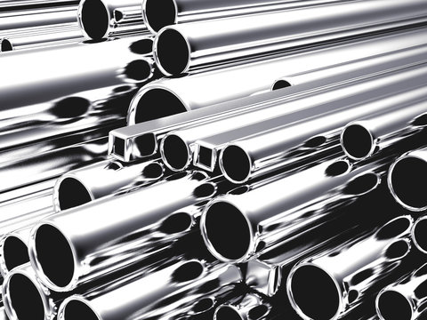 Round metal tubes and pipes of different diameters as background